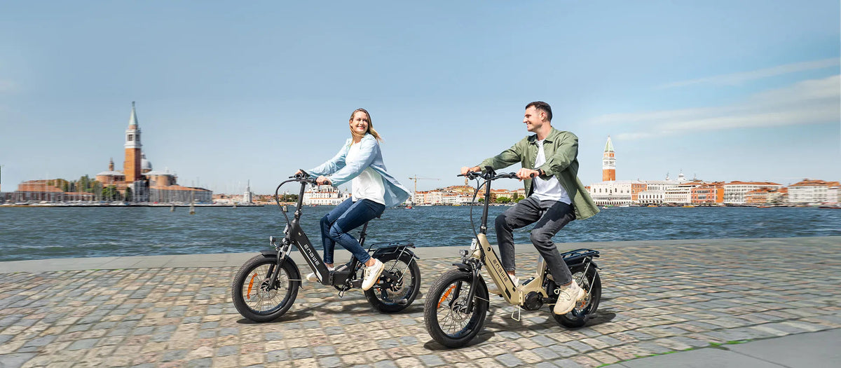 Two ENGWE riders by the waterfront in Venice